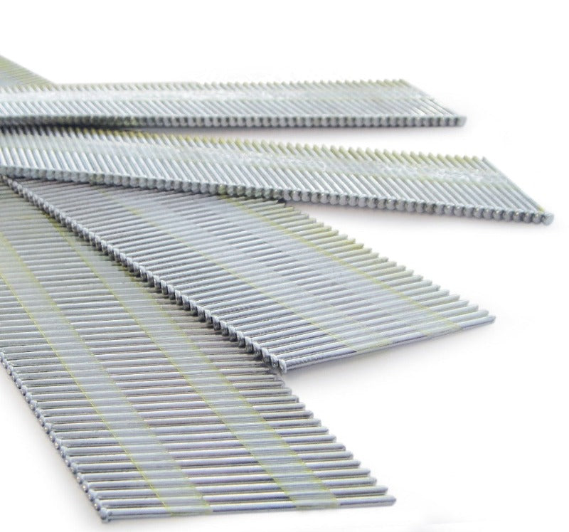 Collated angled finish nails close-up, metal tips on parallel strips