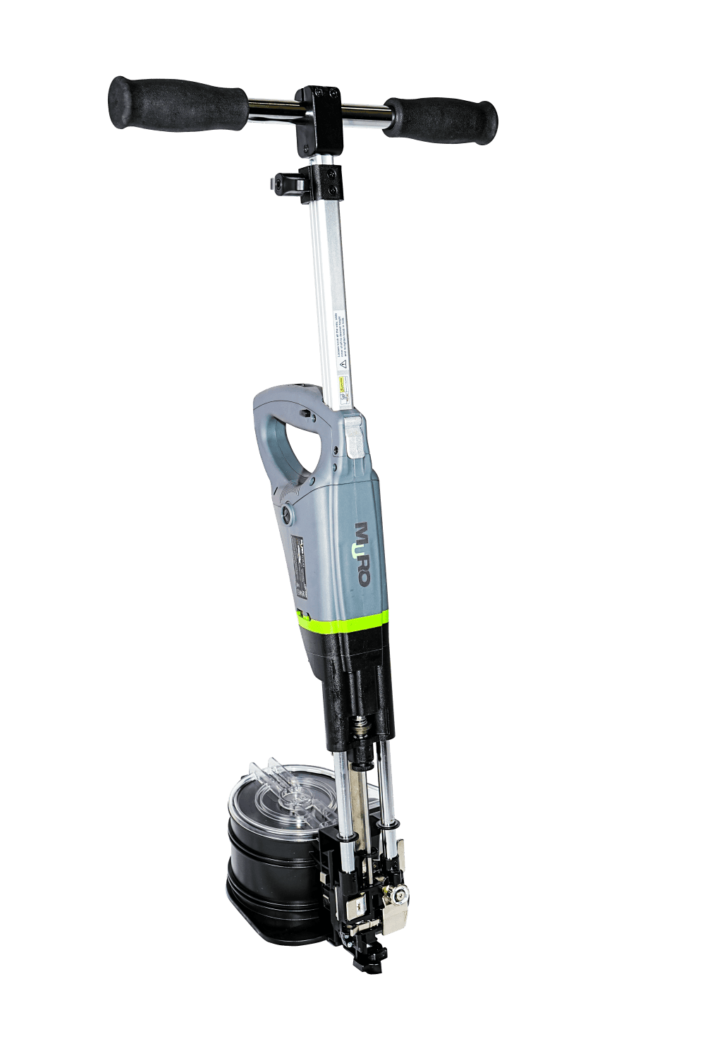 A cordless stump grinder with a T-handle and a circular cutting drum, shown against a solid green background. The product features a gray and black body with a bright lime green accent band.